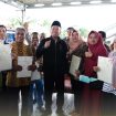 Menteri Agraria dan Tata Ruang/Kepala Badan Pertanahan Nasional (ATR/BPN), Nusron Wahid (Tengah peci hitam)