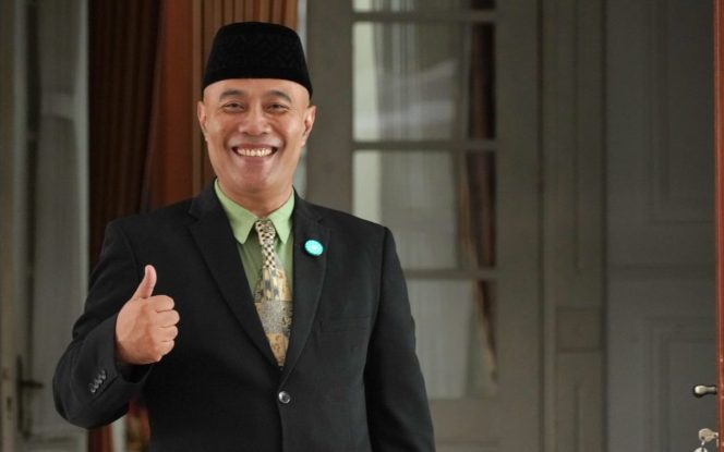 Dr. Rd. Ahmad Buchari, S.IP., M.Si.